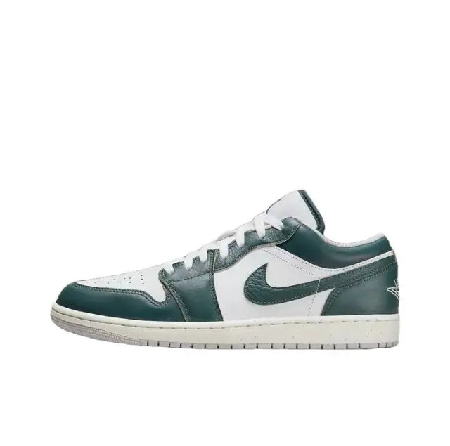 Low-top sneaker side profile in white with dark green Swoosh and ankle collar