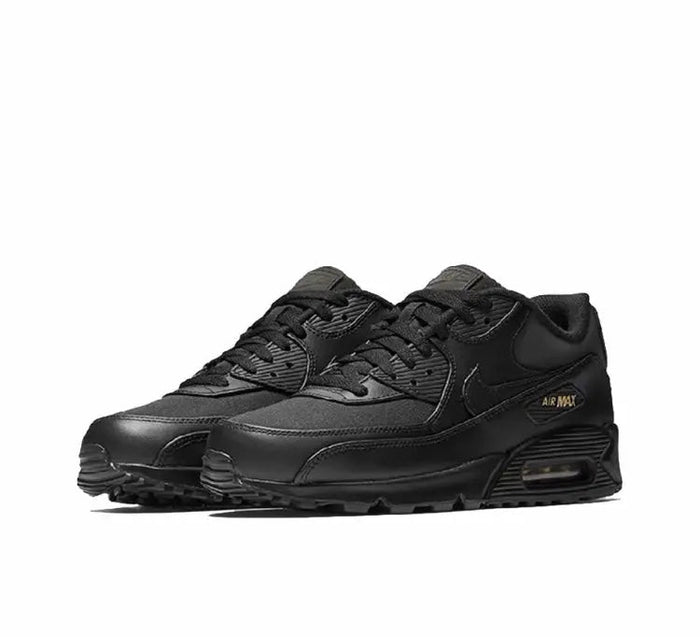 Black Air Max 90 sneakers from side, lace-up with textured uppers and Air Max badge