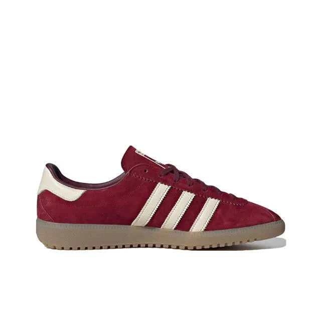 Adidas Bermuda sneaker side profile, maroon upper, white stripes, lace-up and gum sole.