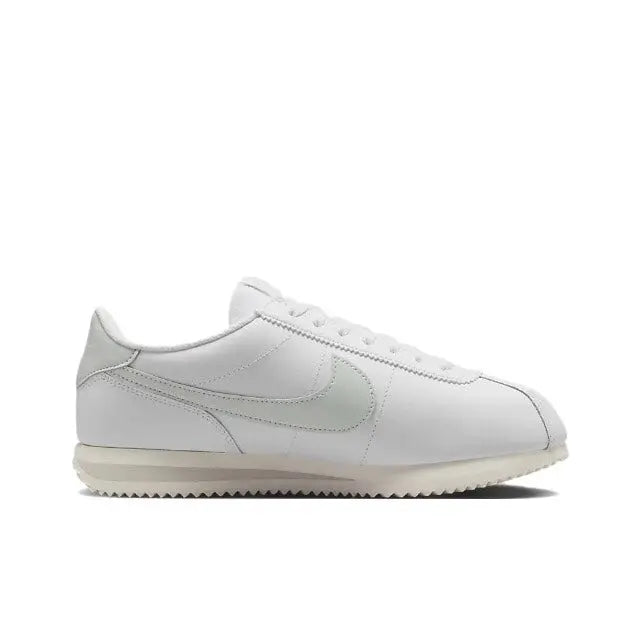 White low-top sneaker with Nike Swoosh and smooth leather upper