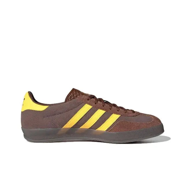 Adidas Gazelle Indoor sneakers in brown with yellow-striped quarter panel