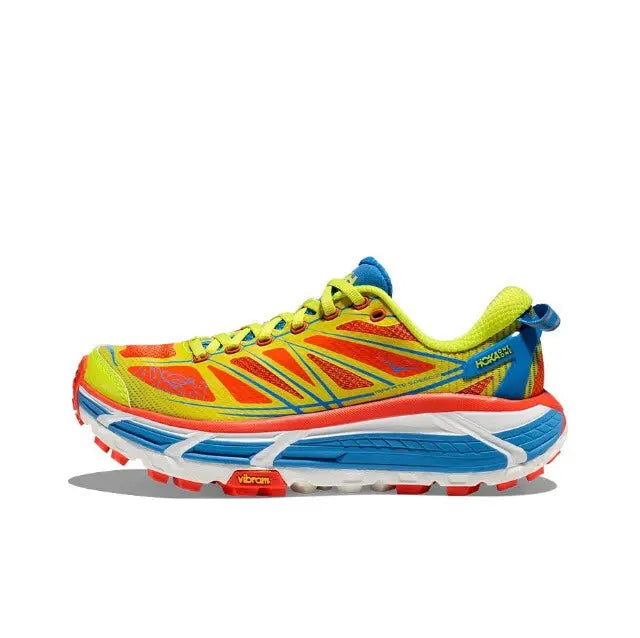 Trail running shoe side view with blue midfoot panel and neon green heel