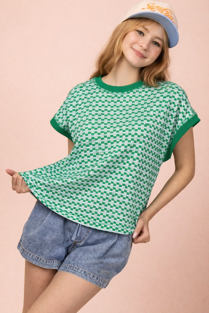 Kelly green honeycomb knit sweater vest with crew neck and short sleeves