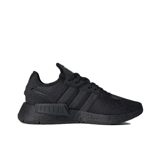 Low-top sneakers side view, dark black fabric and rubber cupsole
