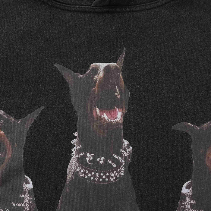 Black hoodie close-up of central dog graphic on chest