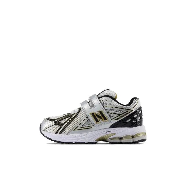 New Balance 1906R low-top sneakers, silver with dark N logo, lace-up