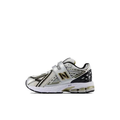 New Balance 1906R low-top sneakers, silver with dark N logo, lace-up
