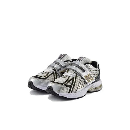 New Balance 1906R sneakers, silver upper with black overlays, lace-up