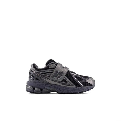 Black lace-up running shoes with gray overlays and cushioned midsole
