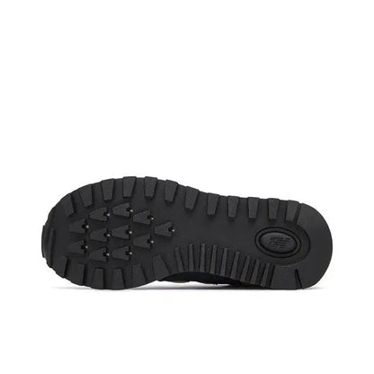 Retro running sneaker outsole with black rugged tread and circular logo