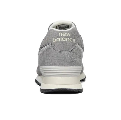 Grey lace-up sneaker heel view with off-white midsole and New Balance logo