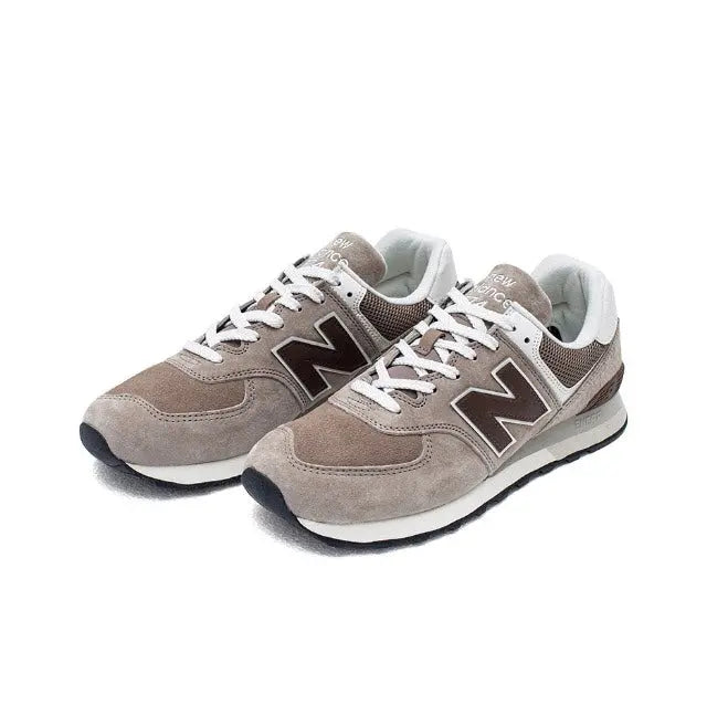 New Balance 574 sneakers, brown and gray with white laces and N side logo