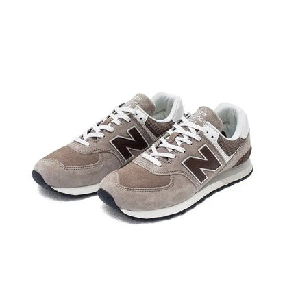 New Balance 574 sneakers, brown and gray with white laces and N side logo