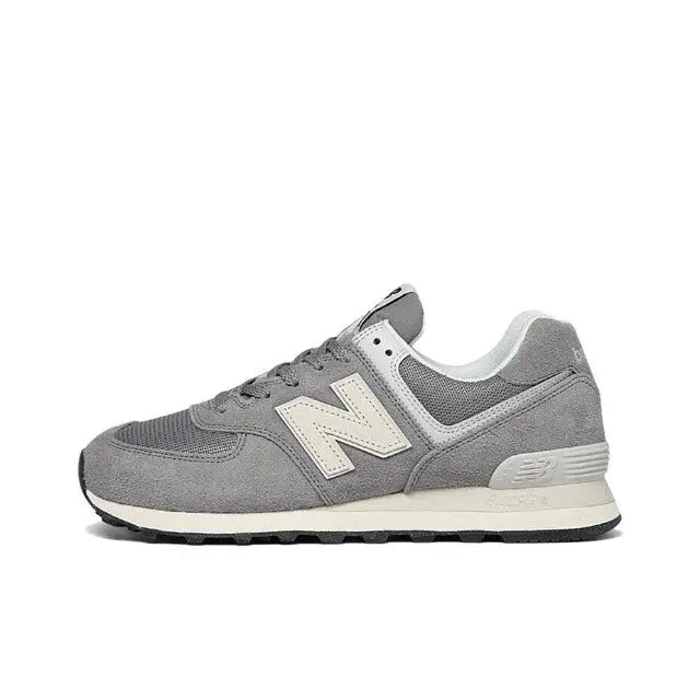 Grey low-top lace-up sneaker side view with off-white N logo and dark outsole