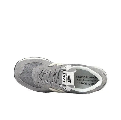 Grey sneaker toe and tongue label view with off-white heel pull and logo