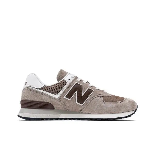 New Balance 574 sneakers, light tan suede with brown N logo and white collar