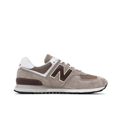New Balance 574 sneakers, light tan suede with brown N logo and white collar