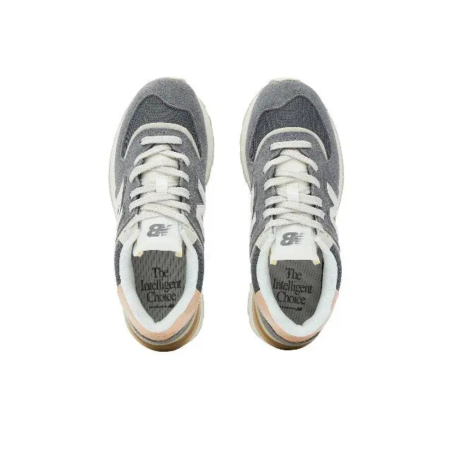 Apollo Grey 574 sneakers showing lace-up front and printed tongue lining