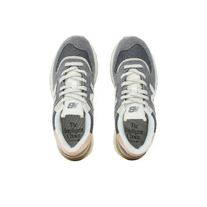Apollo Grey 574 sneakers showing lace-up front and printed tongue lining