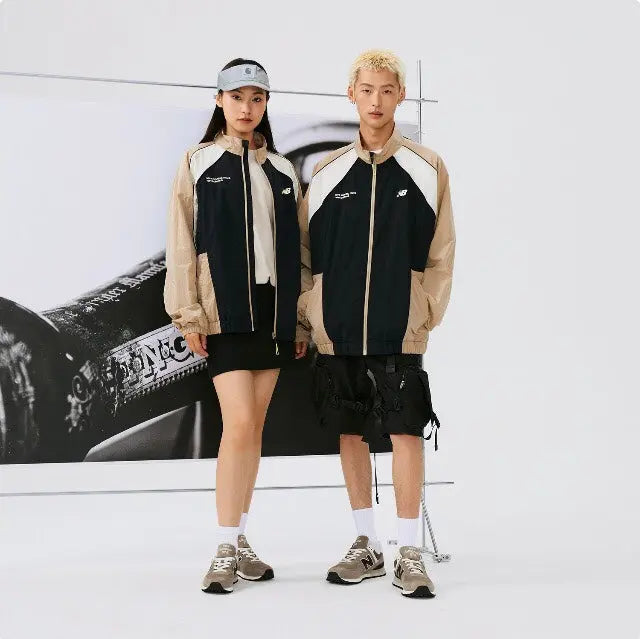 New Balance 574 sneakers worn with casual shorts