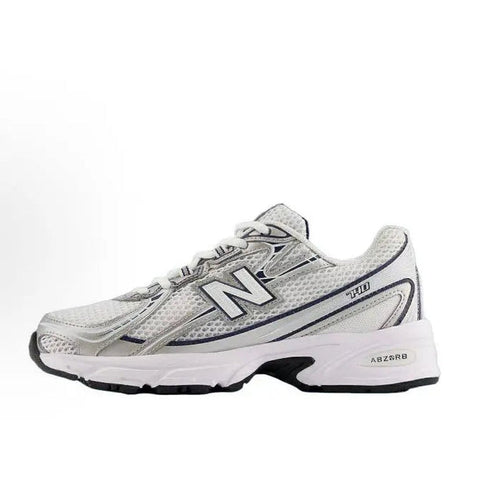 New Balance 740 running shoe in light grey with navy accents and N logo