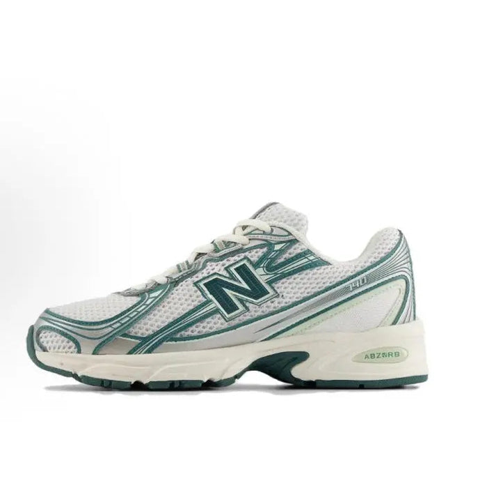 New Balance 740 running sneaker, white mesh with green accents and N logo