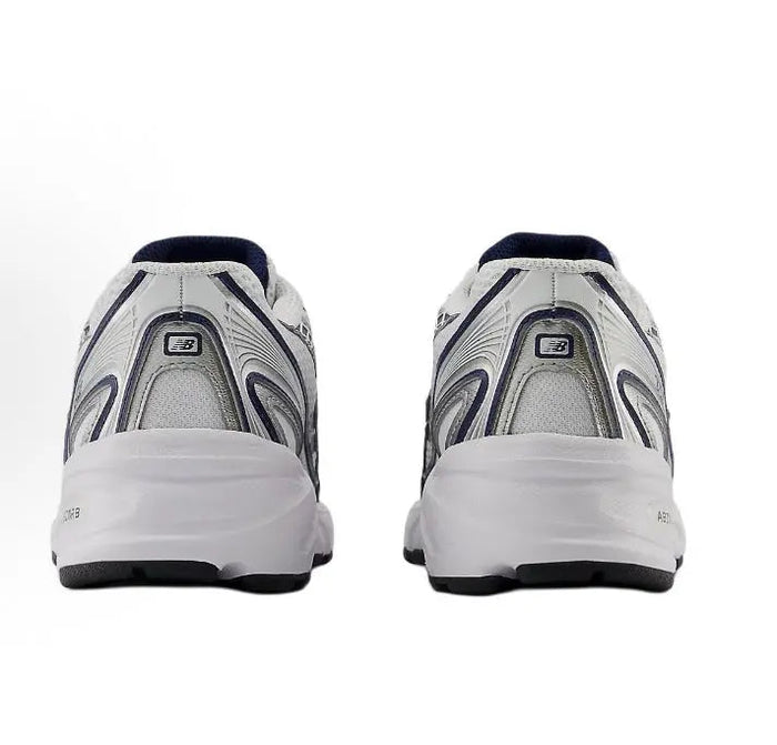 Running shoe heel view with white sole, dark heel panel, and navy collar