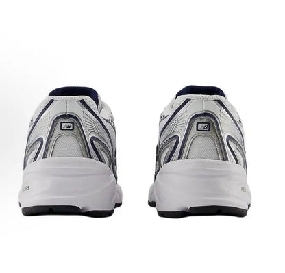 Running shoe heel view with white sole, dark heel panel, and navy collar
