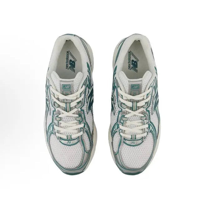 Lace-up running sneaker pair, white mesh uppers with teal-green trim