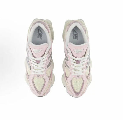 Pink and cream lace-up sneakers viewed from above with padded tongue and N logo