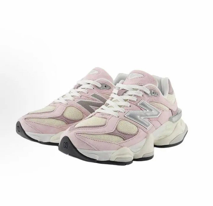 Pink and cream lace-up running sneakers with oversized sole and side New Balance logo