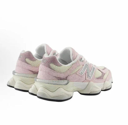 Pink and cream running sneaker pair side view with heel tab and thick sole