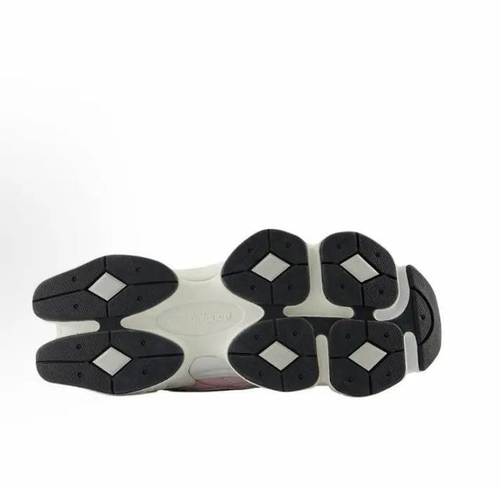 Cream and black sneaker outsoles with multiple traction pods