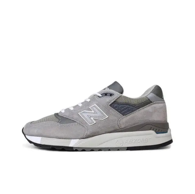 New Balance 998 grey low-top sneakers, N logo, white laces, dark cushioned sole