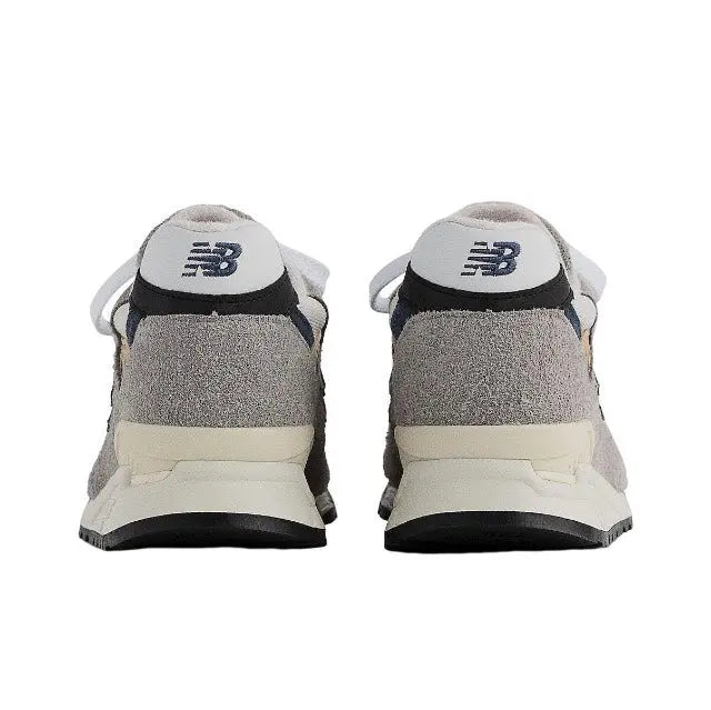 Sneaker heels in grey with blue/white back branding, cushioned collar, lace-up
