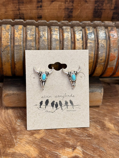 Silver-tone turquoise stud earrings with two oval stones and detailed silver backs