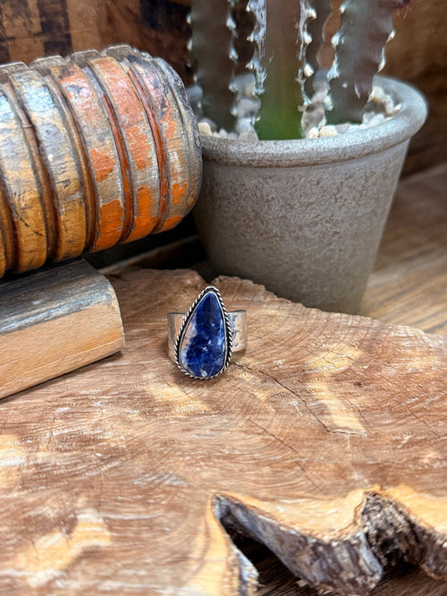 Adjustable silver-plated brass ring with teardrop blue sodalite gemstone