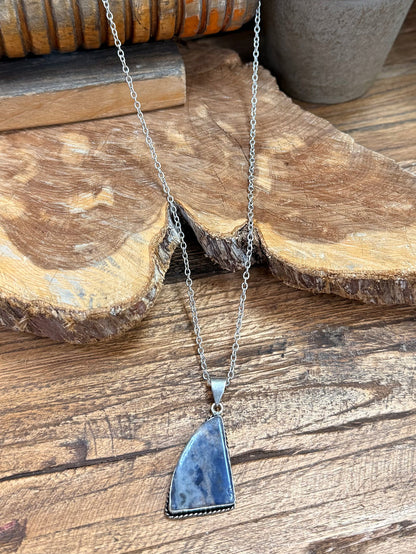 Silver chain necklace with blue triangular stone pendant