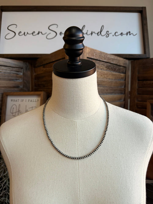 Sterling silver beaded necklace with 4mm round beads, 20-inch length