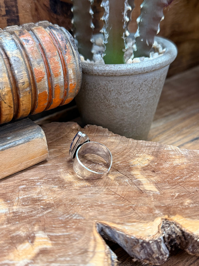 Adjustable silver-plated brass ring with blue sodalite teardrop stone and band view