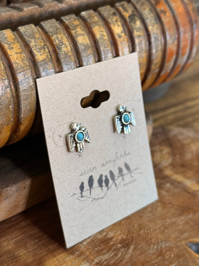 Silver thunderbird stud earrings with turquoise center, side view showing stud posts