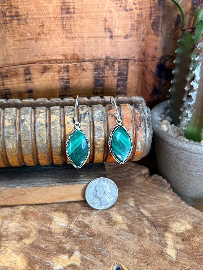 Teal malachite stone fishhook earrings with silver-tone oval settings