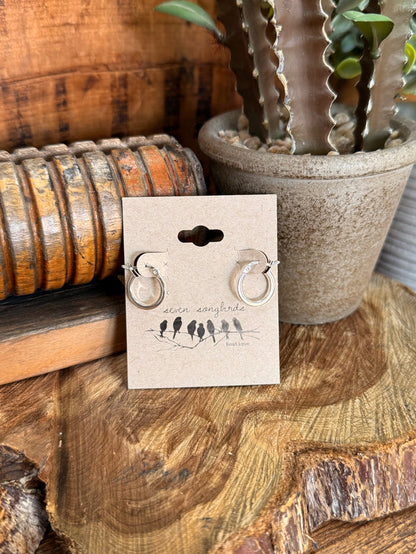 Sterling silver squared-off hoop earrings on display card