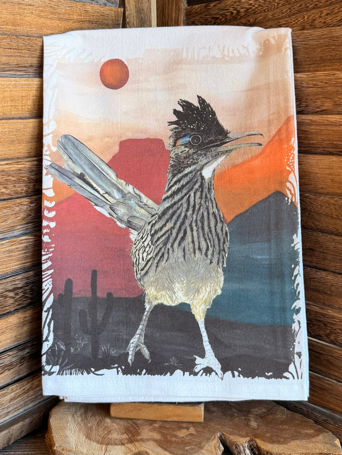 Watercolor tea towel with road runner standing, sunset colors, and cacti silhouettes