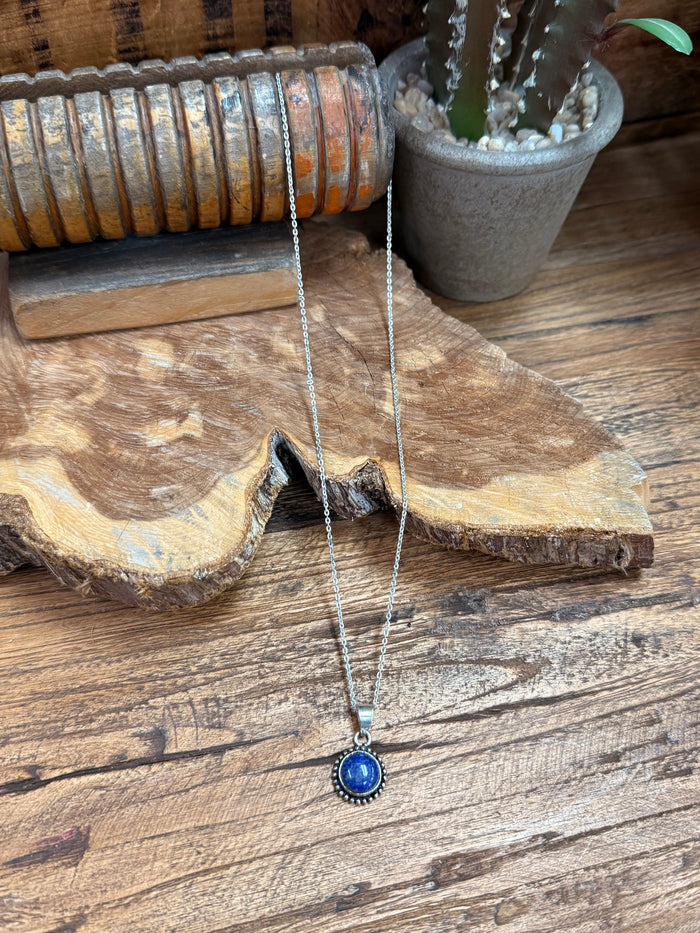 Silver-plated necklace with round blue lapis-look pendant on thin chain
