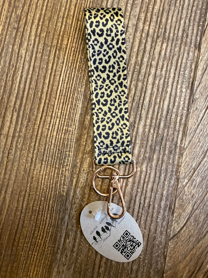 Leopard patterned wristlet key chain with gold keyring and round QR tag