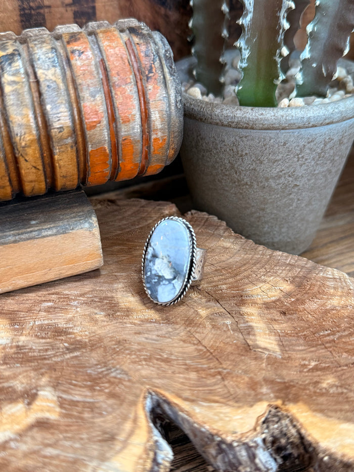 Oval turquoise stone set in silver-tone bezel adjustable brass ring