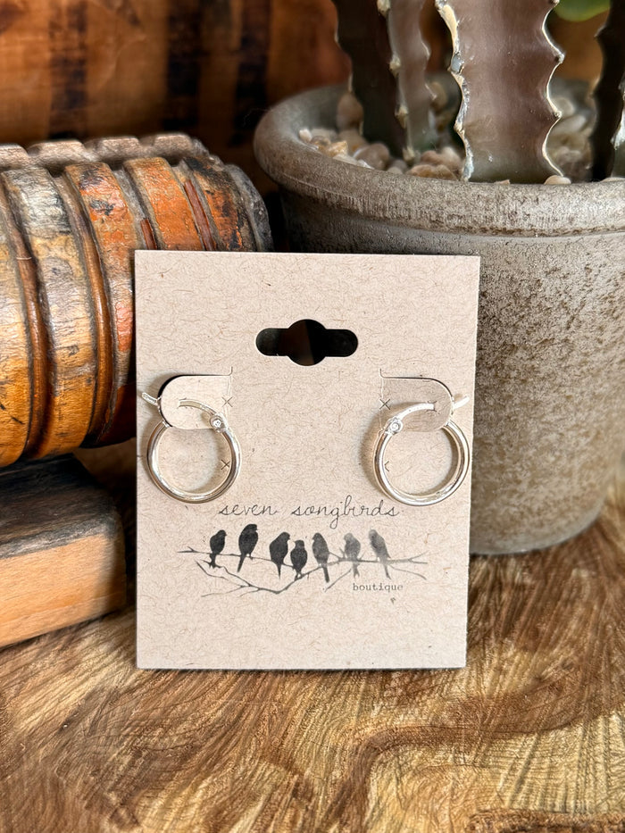 Silpada sterling silver round hoop earrings with circular loops on gift card