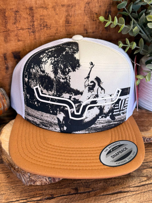 Beige trucker cap side view with Snapback patch and western front graphic
