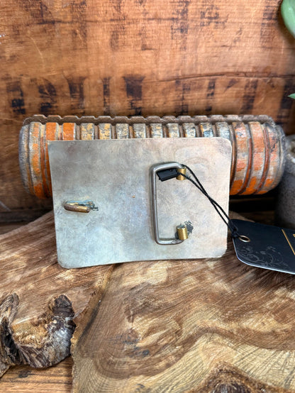 Turquoise stone belt buckle backside with metal buckle bar and pin hardware